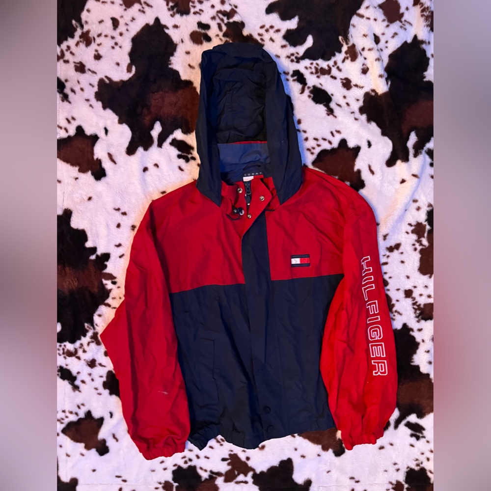 Blue, red, and white Tommy Hilfiger rain coat size XXL
